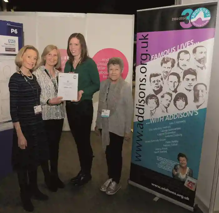 Helen receiving the Annette Louise Seal Memorial Award from the Addison’s Disease Self-Help Group at SfE BES 2019, alongside (far left) Dr Helen Turner (Consultant Endocrinologist, Oxford Centre for Diabetes, Endocrinology and Metabolism). &#169;H Loo