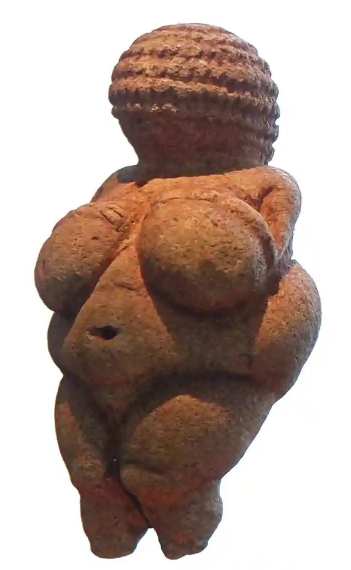 Venus of Willendorf, a female Palaeolithic limestone figurine tinted with red ochre. &#169;Naturhistorisches Museum, Vienna/Steven Zucker (reproduced under CC BY-NC-SA 2.0 licence; https://creativecommons.org/licenses/by-nc-sa/2.0)