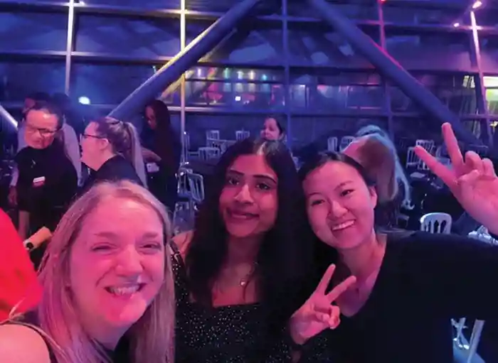 Kim with Sumetha Sureshkumar and Ruijuan Xu at the conference dinner.